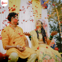 Indian couple celebrating wedding ceremony with flower shower during shubh vivah muhurat 2026 as per Hindu Panchang