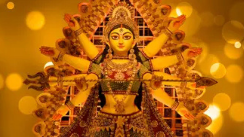 Idol of Goddess Durga with multiple arms in golden decoration during Chaitra Navratri 2026 festival