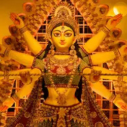 Idol of Goddess Durga with multiple arms in golden decoration during Chaitra Navratri 2026 festival