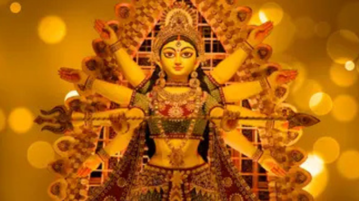 Idol of Goddess Durga with multiple arms in golden decoration during Chaitra Navratri 2026 festival
