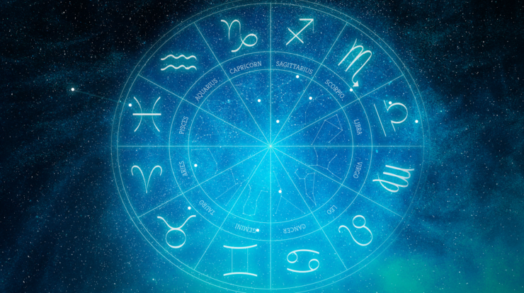 Zodiac wheel with all 12 astrological signs against a starry blue cosmic background representing Monthly horoscope May 2026